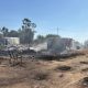 Incendio asentamiento palos
